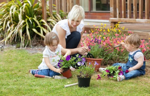 Gardening tools and safety equipment arranged for a training session